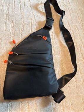 Black Men's Sling Crossbody Bag with Orange Zipper Accents